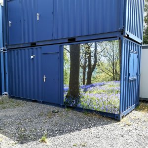 New 20ft x 8ft Portable Building With Woodland Scene Panel £2900+Vat.